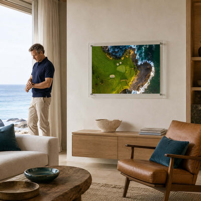 coastal hazard acrylic wall art hanging in living space with man standing next to it