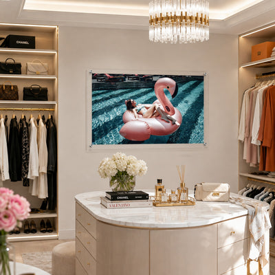 Pink flamingo pool wall art displayed in a luxury walk-in closet