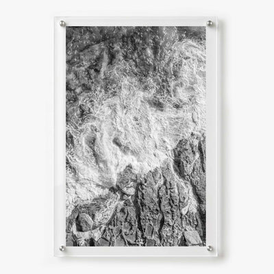 Foam and Fire wall art shown in a vertical 24x36 acrylic frame design with white background