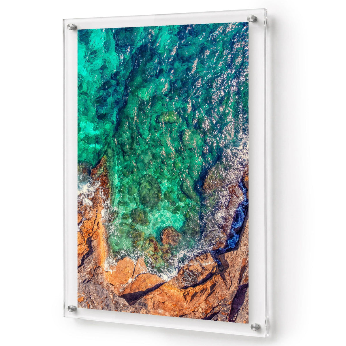 Sea Glass Shore wall art shown in a vertical acrylic frame with white background