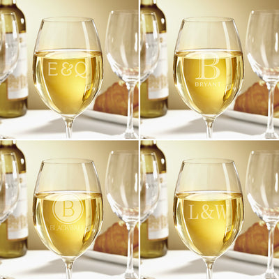 Four-panel image of white wine glasses with different monograms; wine bottle, empty glasses, and bread in background.