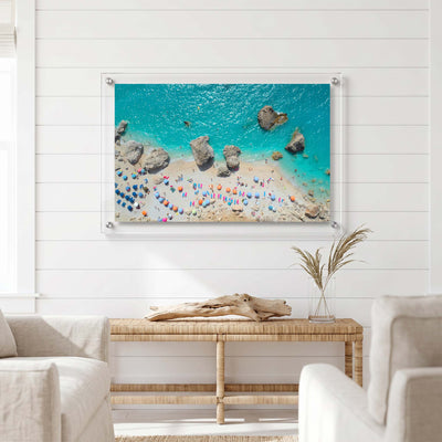 Aerial beach acrylic wall art displayed in a bright coastal living room