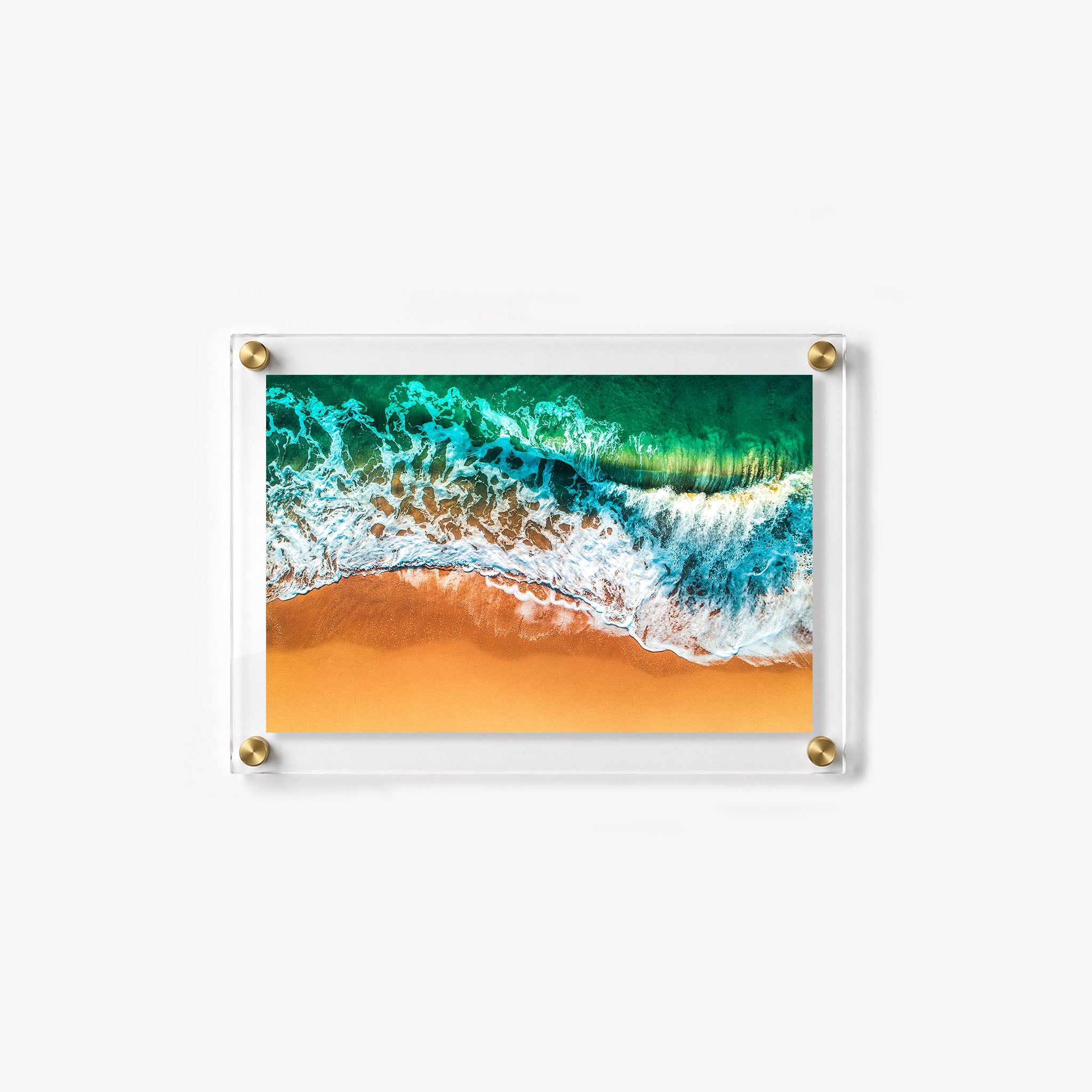 Turquoise surf meets golden sand in this colorful coastal acrylic wall art