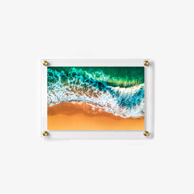 Turquoise surf meets golden sand in this colorful coastal acrylic wall art