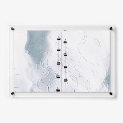 Acrylic wall art featuring ski lifts above a snowy mountain