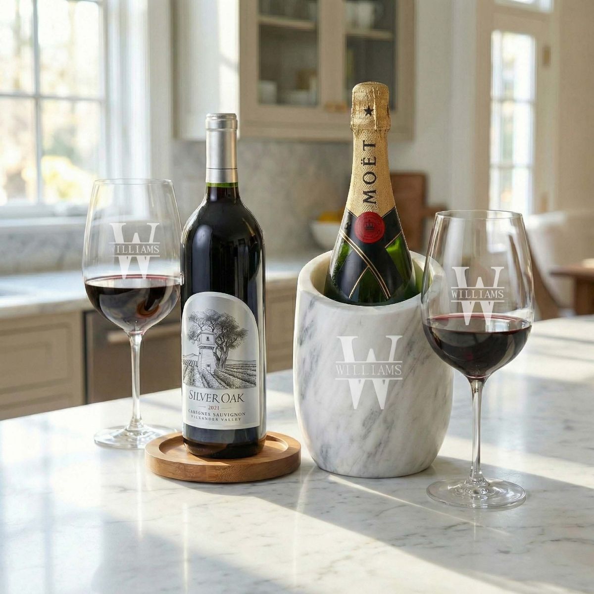 Wine bottles with marble wine chiller and two engraved wine glasses