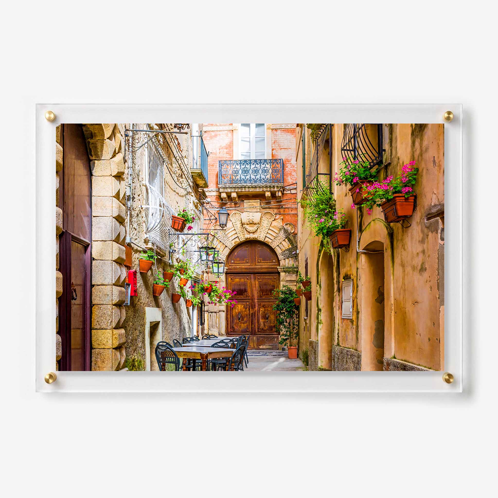 Colorful old town street scene displayed as acrylic wall art