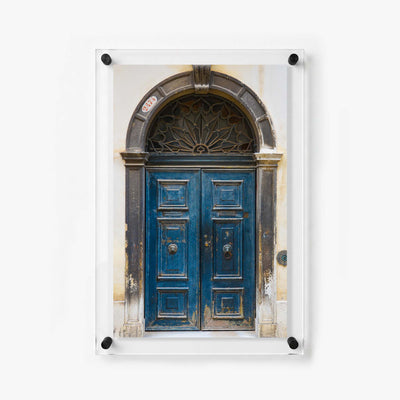 Rustic doorway wall art featuring a deep blue entrance
