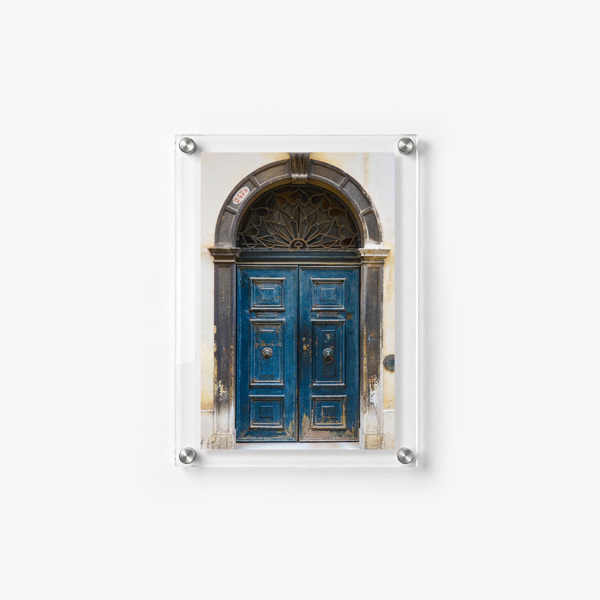 Travel wall art showing a distressed blue European door