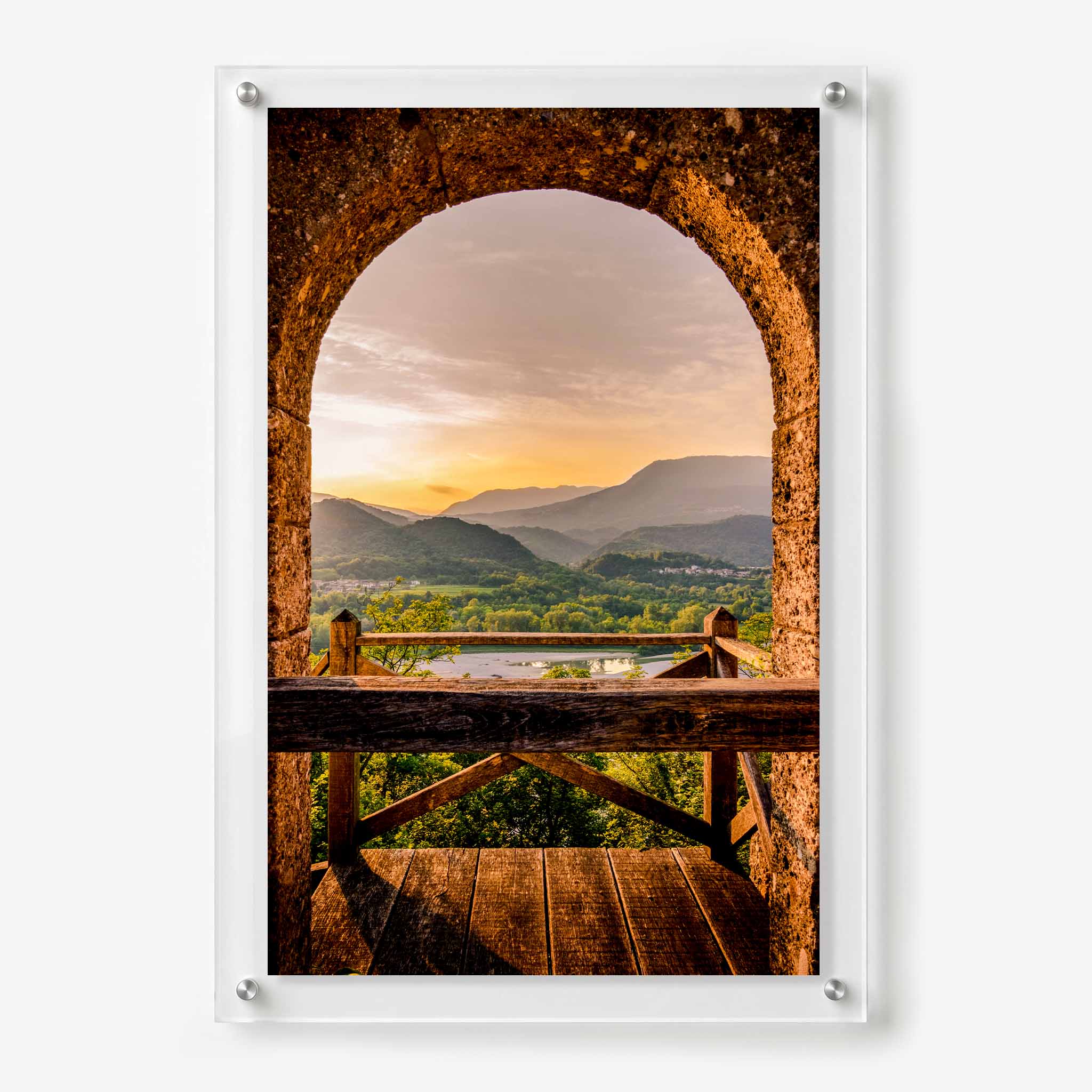 Acrylic wall art featuring a mountain valley at sunset at an old stone arch