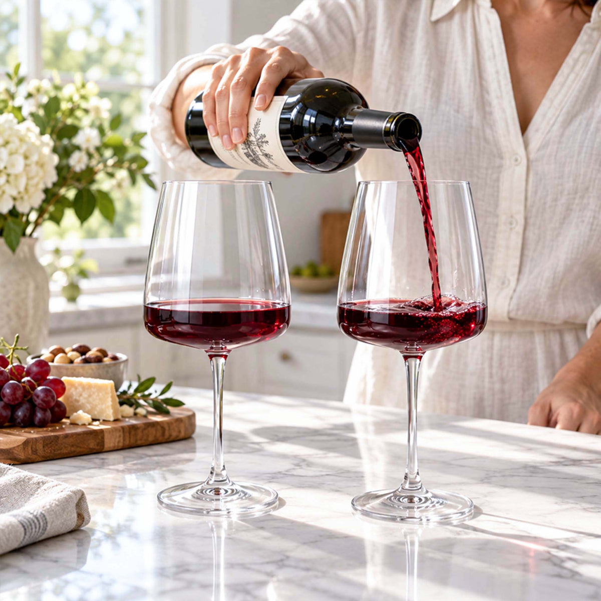 red wine being poured into Montclair wine glasses