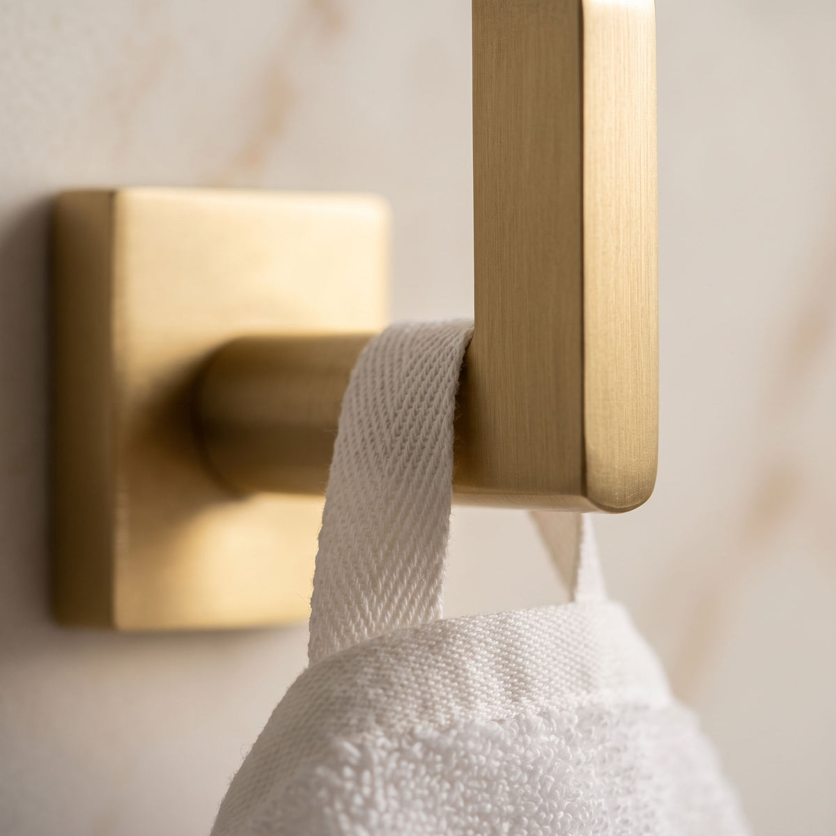 Close up of a white Rivera Turkish cotton towel hanging