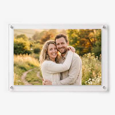 Custom acrylic photo frame displaying a couple’s portrait with silver standoff