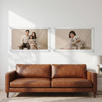 Acrylic photo print display showing a family portrait and a child with a dog