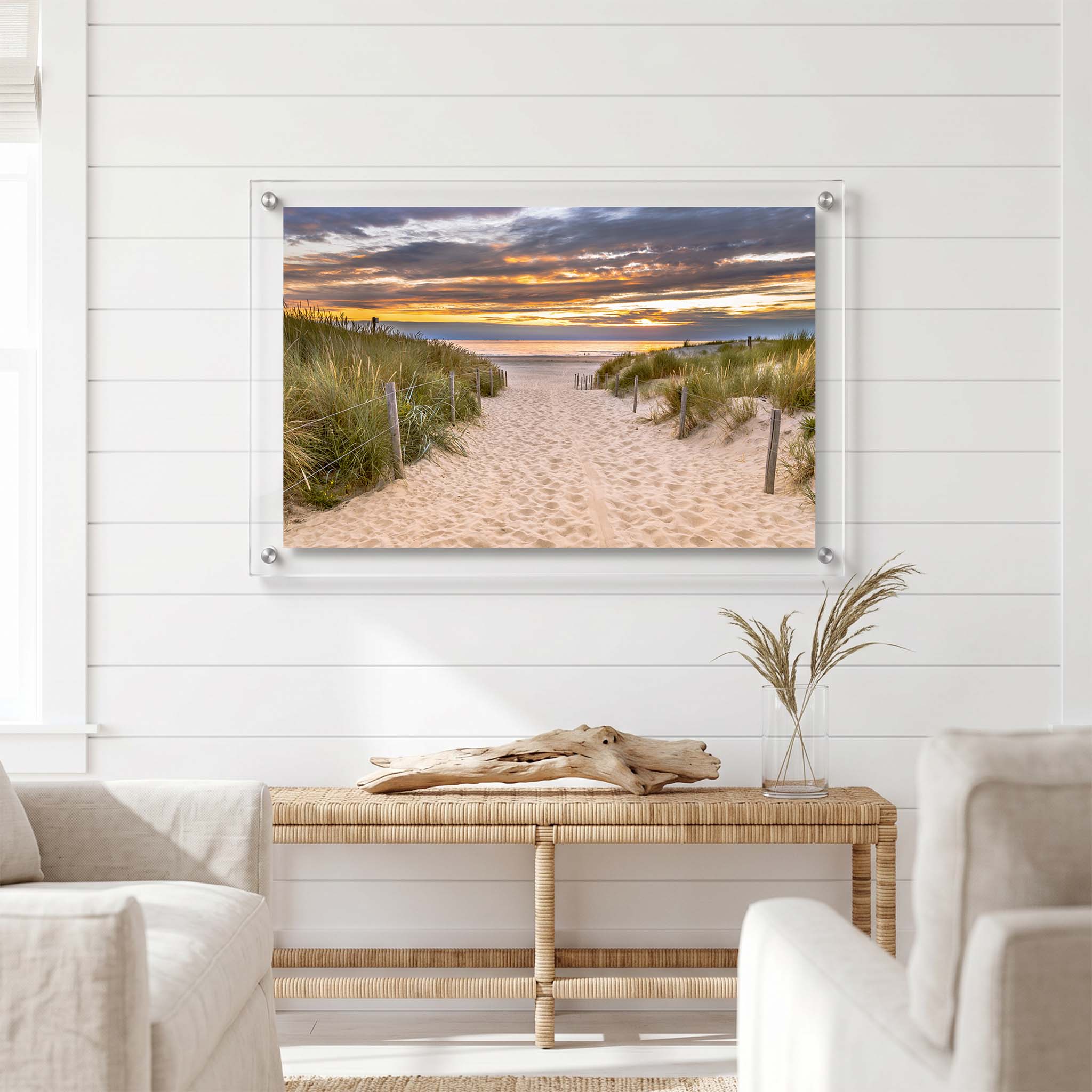 Coastal acrylic wall art print displayed in a bright living room