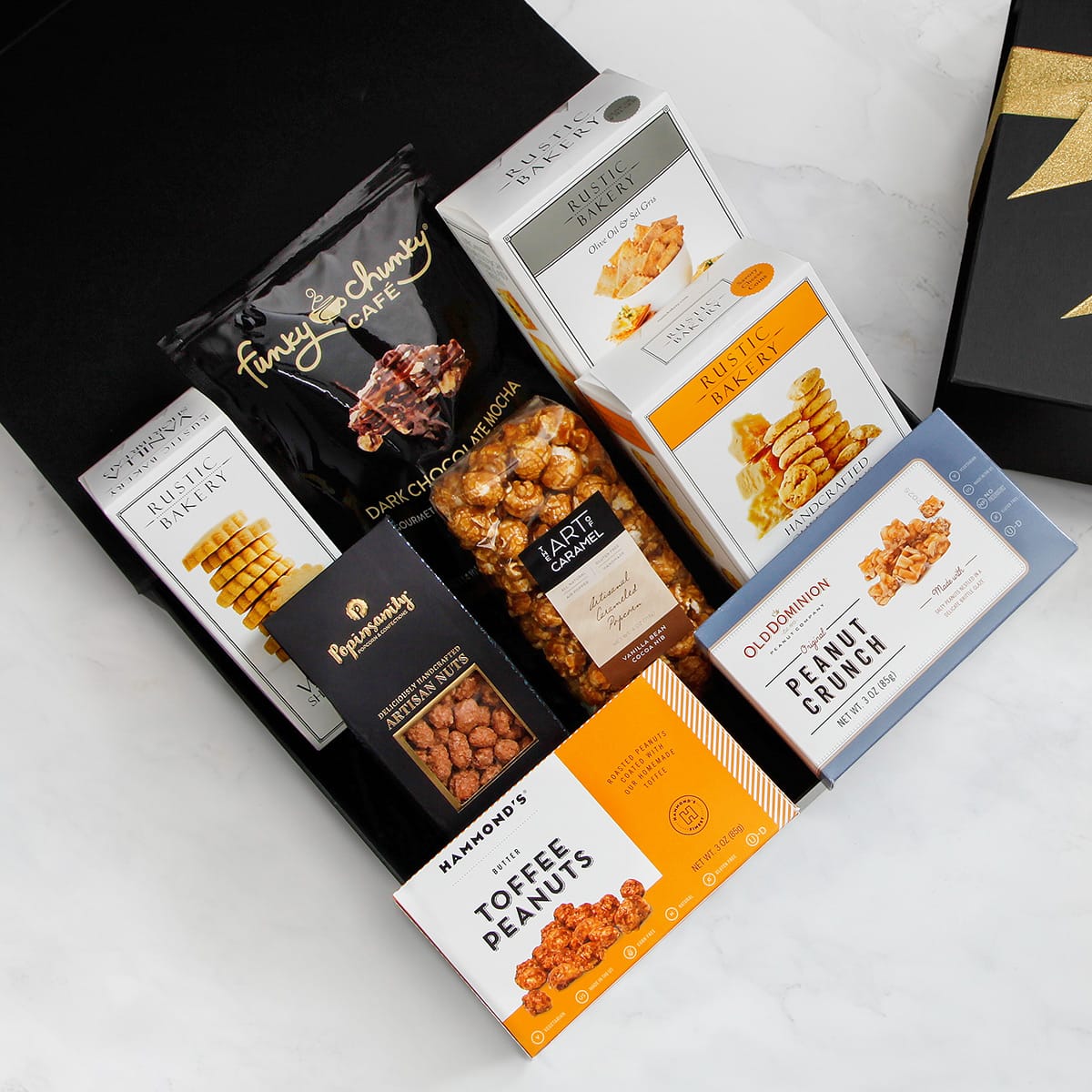 Nibblers Delight Deluxe Snack Basket - Large. A display of cookies, crackers, popcorn, and nuts.