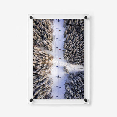 Aerial alpine scene with colorful chairlifts
