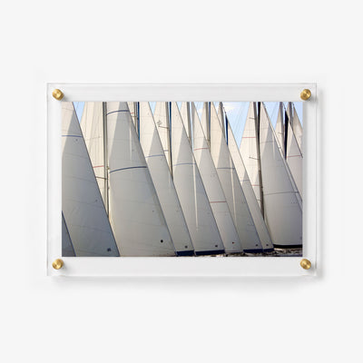 Horizontal acrylic print featuring tightly grouped sailboats
