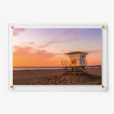 Acrylic wall art featuring a lifeguard tower on a sandy beach