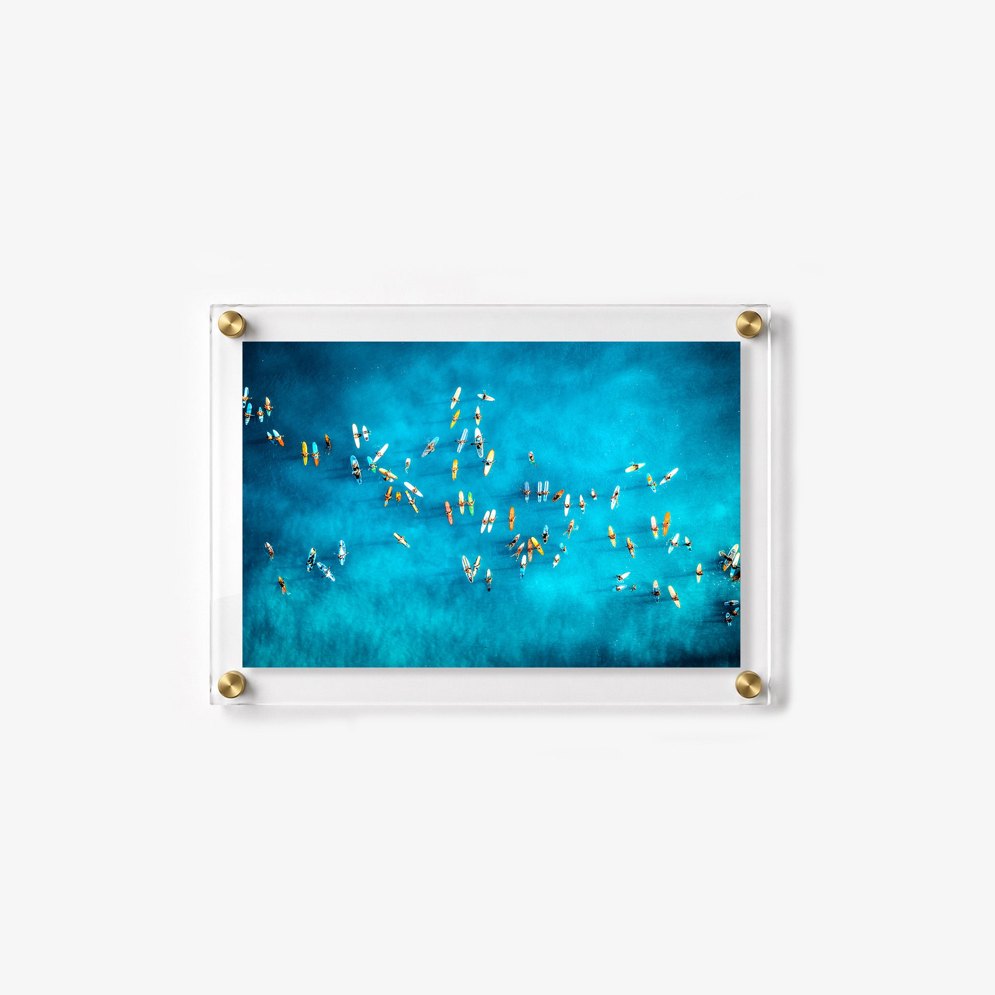Acrylic wall art showing surfers waiting for waves in calm turquoise ocean water
