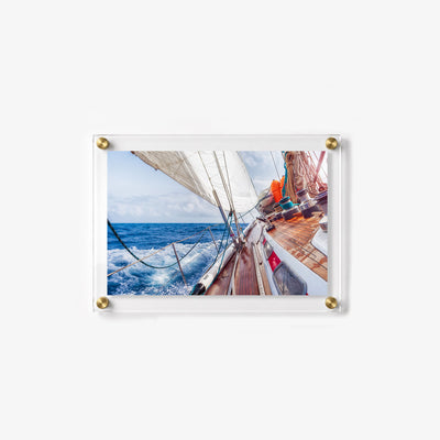 Dynamic sailing scene captured from onboard as the boat heels into the wind