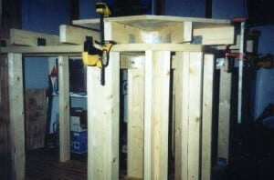 applying plywood to the top of our homemade bar