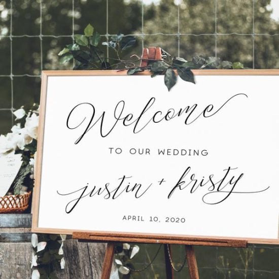 Simple White Wedding Welcome Sign on Easel