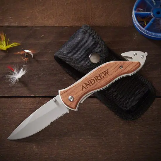 Personalized serrated hunting knife with carrying pouch