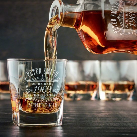pouring bourbon into a square whiskey glass