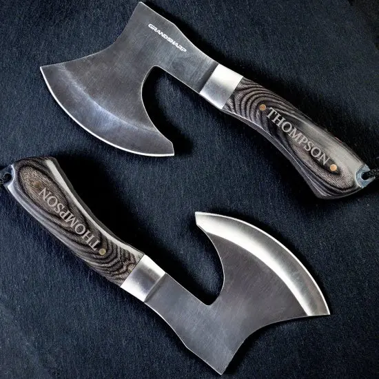 two engraved choppa meat knives