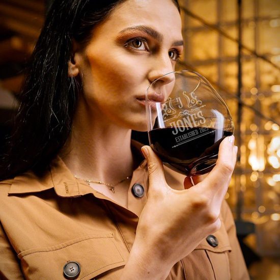 woman drinking from wine glass