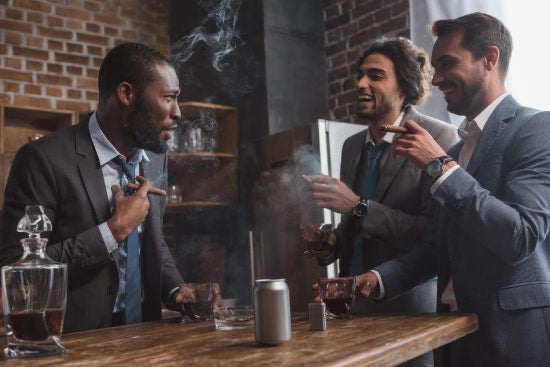 Men smoking cigars in suits