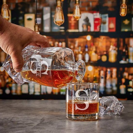 Twist decanter pouring bourbon into glass