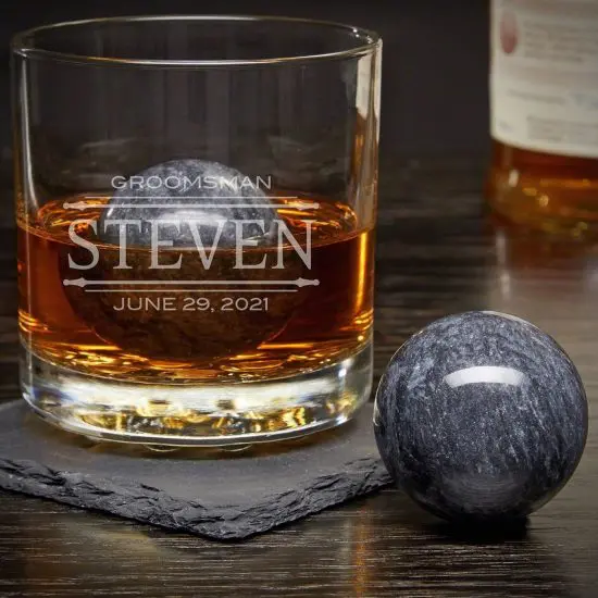 Whiskey glass with perfect sphere whiskey rock