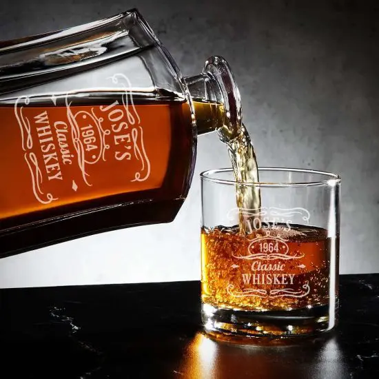 Pouring whiskey from decanter into whiskey glass