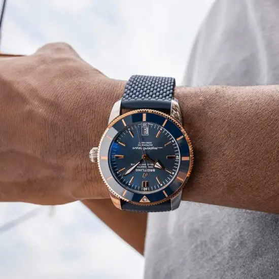 Man wearing Breitling Superocean watch