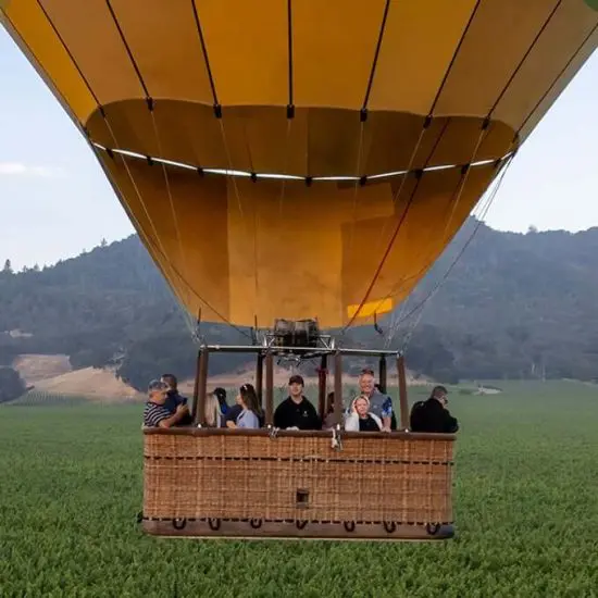 People inside hot air balloon before takeoff