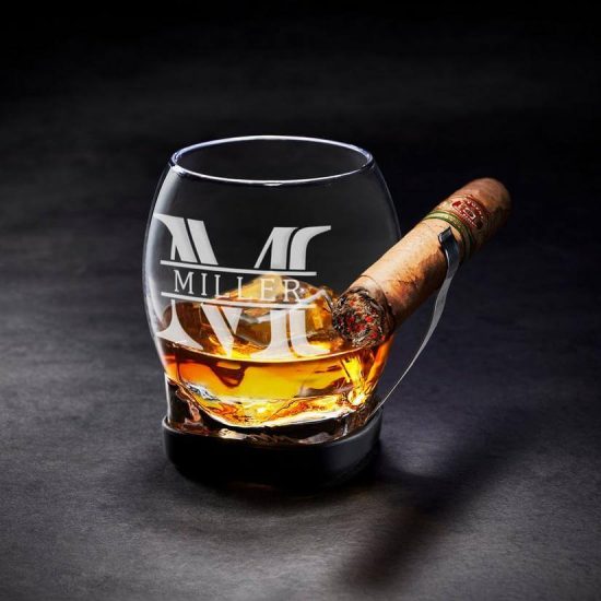 Whiskey glass with built-in clip-on cigar holder