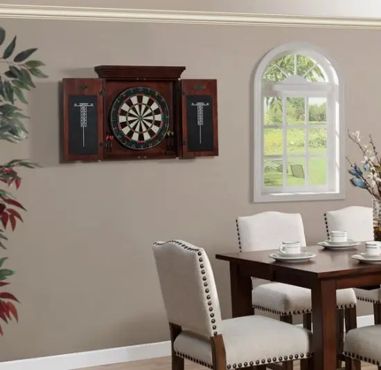 Athos dartboard cabinet hung in living room