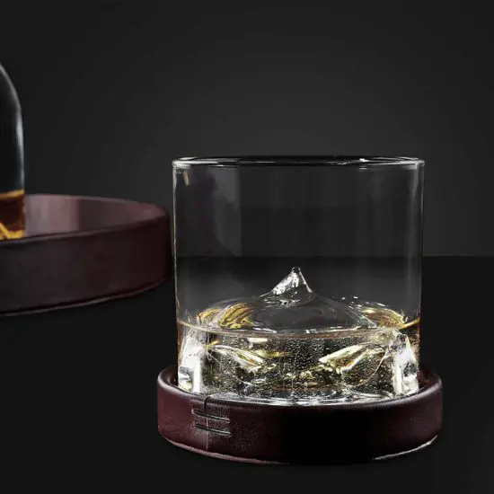 Everest whiskey glass with bourbon inside
