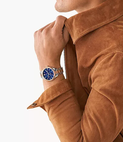 Man wearing matching multifunctional Fossil watch for couples