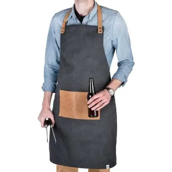 Man wearing Foster and Rye canvas grilling apron