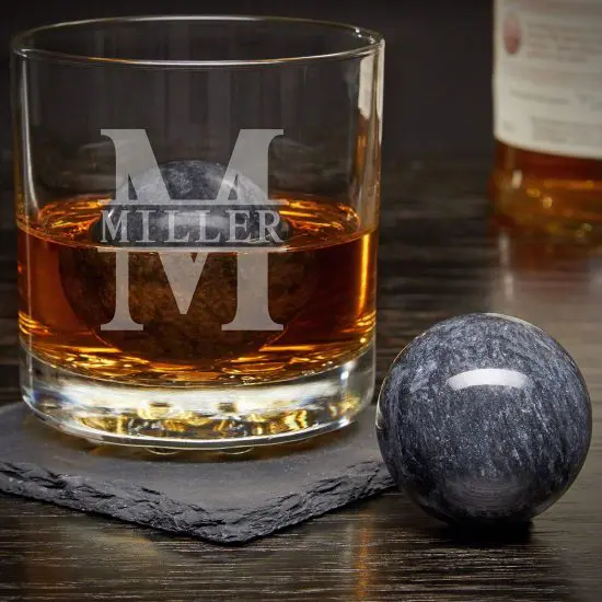 Whiskey glass with two spherical whiskey stones