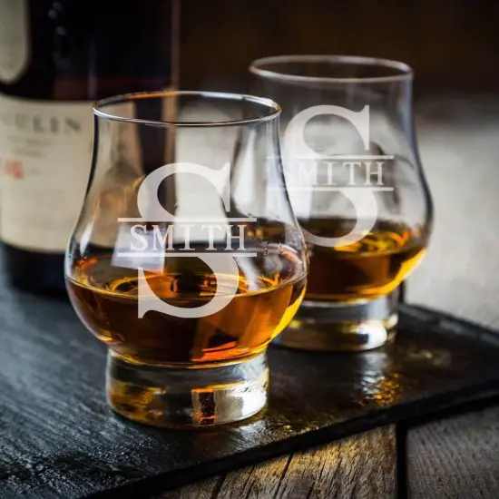 Two snifter glasses with bourbon inside