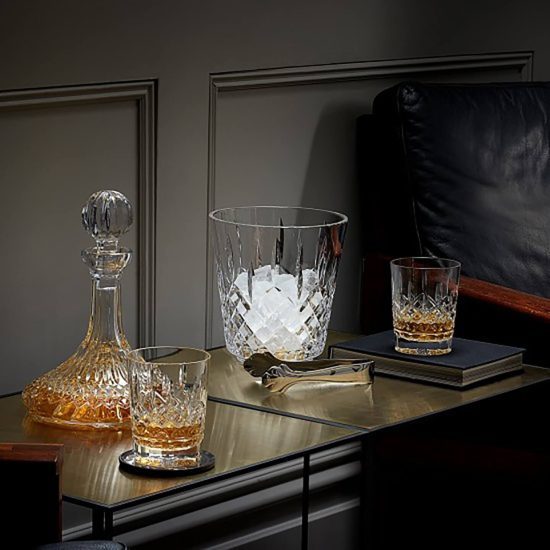 Waterford ships decanter on table with bourbon