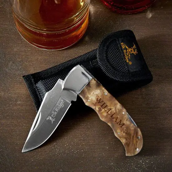 Engraved pocket knife with knife pouch