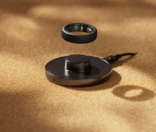 Oura ring hovering over charging station