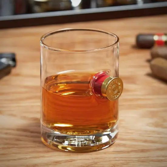 Shotgun whiskey glass with whiskey inside