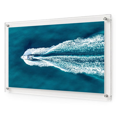 The Getaway acrylic wall art featuring a speedboat on blue ocean water