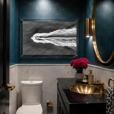 Horizontal nautical wall art featuring a boat cutting through dark water